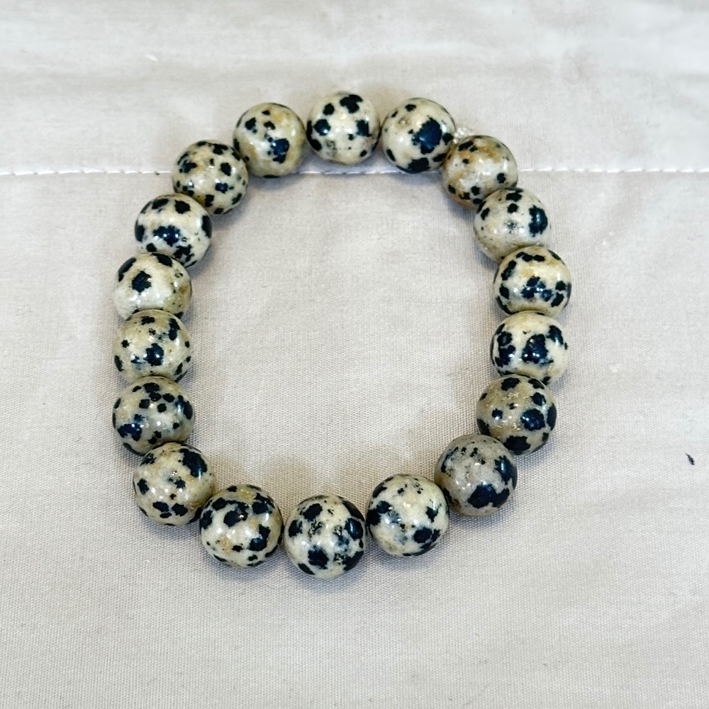 Dalmatian Stone, round beaded stretchy bracelet. 9.5mm beads